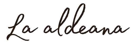 Logotipo tipográfico oscuro de La Aldeana